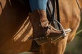 Cowboy boot in stirrup. Horseback riding. Wild West. Horse. Royalty Free Stock Photo