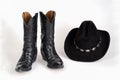 Cowboy Boots and Hat with Concho Hatband. Royalty Free Stock Photo