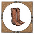 Cowboy boots in the western leather frame on white background. Royalty Free Stock Photo