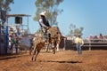 Cowboy Riding bucking Bull At Rodeo Royalty Free Stock Photo