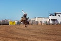 Cowboy Bull riding At Country Rodeo