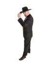 Cowboy businessman tipping hat