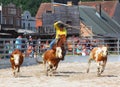 The Cowboy in a Calf roping competition. Royalty Free Stock Photo