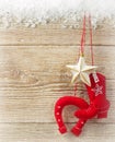 Cowboy christmas background with western toy boot and star on wood