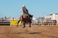 Cowboy Riding Bull At Country Rodeo Royalty Free Stock Photo