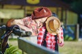 Cowboy couple kissing a guy and girl in cowboy hats.