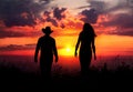 Cowboy couple silhouette at sunset Royalty Free Stock Photo