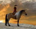 Cowboy Ethan looks out at Prairie with Quarter Horse