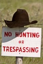 Cowboy hat over posted sign Royalty Free Stock Photo