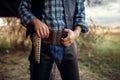 Cowboy with his hand on revolver, wild west