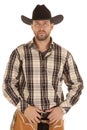 Cowboy hold belt black hat Royalty Free Stock Photo