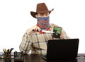 Cowboy holding a knife and hard disk threats on Skype Royalty Free Stock Photo