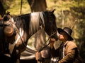 Cowboy kiss the horse with love Royalty Free Stock Photo