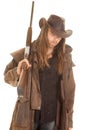 Cowboy long hair rifle over shoulder look