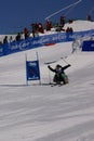 Cowboy losing control on ski slope and falling