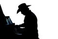 Cowboy Pianist Silhouette Royalty Free Stock Photo