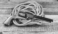 Cowboy Pistol and rope. Royalty Free Stock Photo
