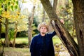 Cowboy Rancher in Forest at Tree