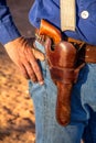 Cowboy with Revolver in Holster