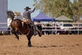 A Cowboy Rides A Bucking Horse