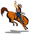 Cowboy riding a bucking bronco Royalty Free Stock Photo