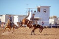 BOWEN RIVER, QUEENSLAND, AUSTRALIA - JUNE 10TH 2018: Cowboy competing in the Saddle Bronc event at Bowen River country rodeo Royalty Free Stock Photo