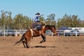 Cowboy Riding A Bucking Bronc Horse At A Country Rodeo Royalty Free Stock Photo