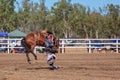 Cowboy Riding A Bucking Bronc Horse At A Country Rodeo Royalty Free Stock Photo