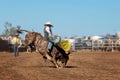 Cowboy Riding Bull At Rodeo Royalty Free Stock Photo