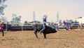 Cowboy Riding Bull At Rodeo Royalty Free Stock Photo