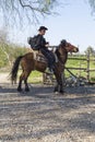 Cowboy riding his horse Royalty Free Stock Photo