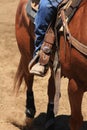 A cowboy riding a horse.