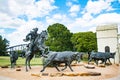 Cowboy rounding up cattle statues in Waco
