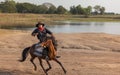 Cowboy`s way of life include riding a horse around locales Royalty Free Stock Photo