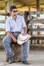 Cowboy seated Royalty Free Stock Photo