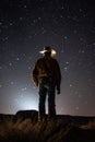 Cowboy star gazing at night sky, created using generative ai technology