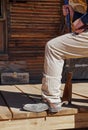 Cowboy steps onto the porch Royalty Free Stock Photo