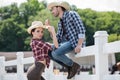 Cowboy style couple posing together on ranch Royalty Free Stock Photo
