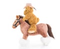 Cowboy Teddy bear riding a horse Royalty Free Stock Photo