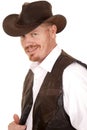 Cowboy in vest and hat look smirk smile Royalty Free Stock Photo