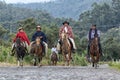 Cowboys arriving on horse back