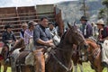 Cowboys gathering in rodeo ring in Ecuador