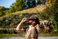 Cowboys in hat. Handsome bearded macho. Man unshaven cowboys. American cowboy. Leather Cowboy Hat. Portrait of young man Royalty Free Stock Photo