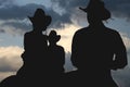 Cowboys in the morning silhouette Royalty Free Stock Photo