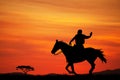 Cowboys silhouette at sunset Royalty Free Stock Photo