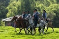 Cowboys taking a horseback ride