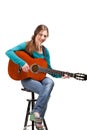 Cowgirl in ahat with acoustic guitar Royalty Free Stock Photo