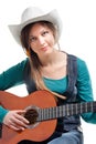 Cowgirl in ahat with acoustic guitar Royalty Free Stock Photo