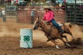 Cowgirl barrel racing at the Wyandotte County Kansas Fair Rodeo Royalty Free Stock Photo