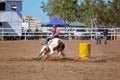 Cowgirl Competing In Barrel Racing Competition At A Rodeo Royalty Free Stock Photo